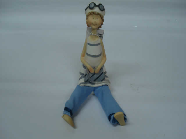 RESINA DECORACION COLECCIÓN MUÑECA NIÑA EN LA PLAYA