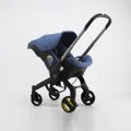 DOONA CARRITO Y CONFORT 2EN1 QUE SE CONVIERTE EN CARRITO - R.N-13KG